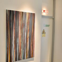 Eingang zur Lasertherapie mit Gemälde